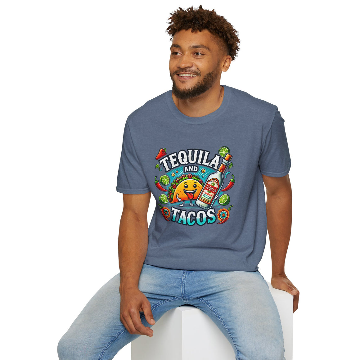 T-shirt featuring a lively 'Tequila and Tacos' design with a cheerful taco character, tequila bottle, lime slices, chili peppers, and festive decorations. Ideal for taco lovers and tequila fans who enjoy a fun, fiesta-inspired look.