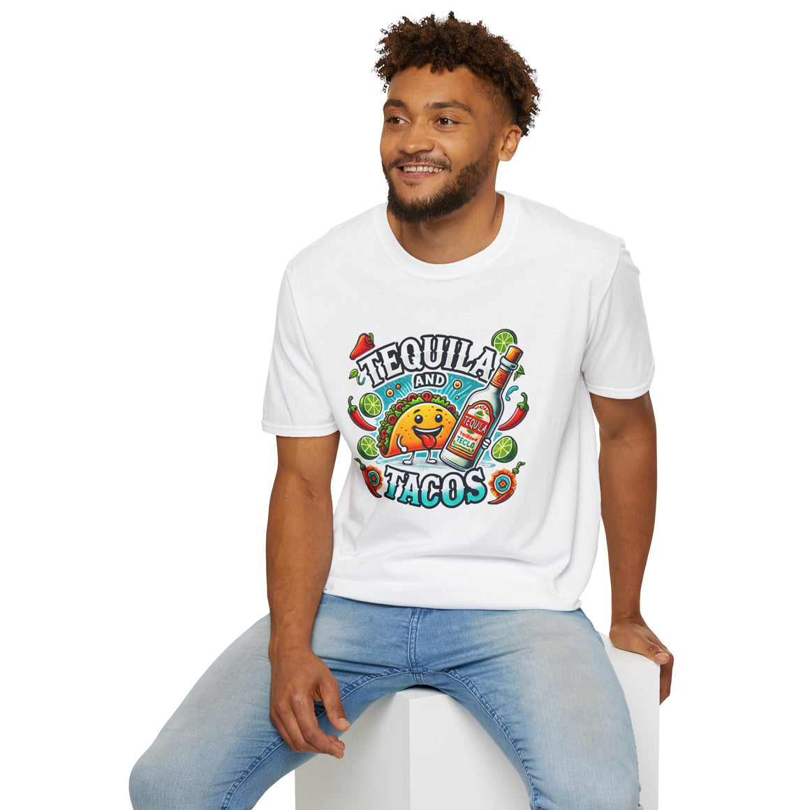 White T-shirt featuring a lively 'Tequila and Tacos' design with a cheerful taco character, tequila bottle, lime slices, chili peppers, and festive decorations. Ideal for taco lovers and tequila fans who enjoy a fun, fiesta-inspired look.