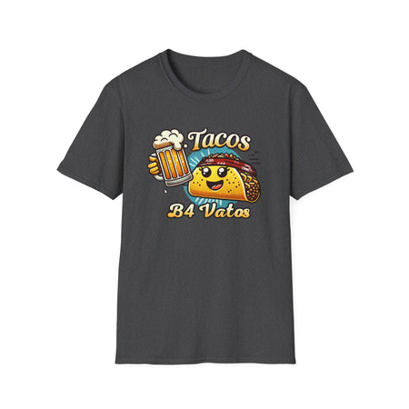 T-shirt featuring a fun 'Tacos B4 Vatos' design with a smiling taco character wearing a bandana and holding a beer mug. Perfect for taco lovers who prioritize food and fun with a playful style.