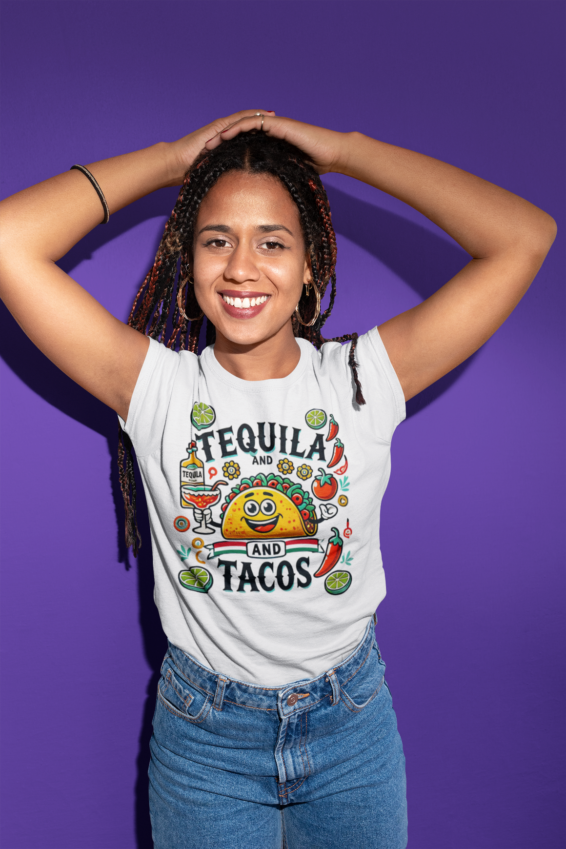 White T-shirt featuring a festive 'Tequila and Tacos' design with a smiling taco character, tequila bottle, margarita glass, lime slices, and chili peppers. Perfect for celebrating fiestas and taco nights with a fun and lively style.