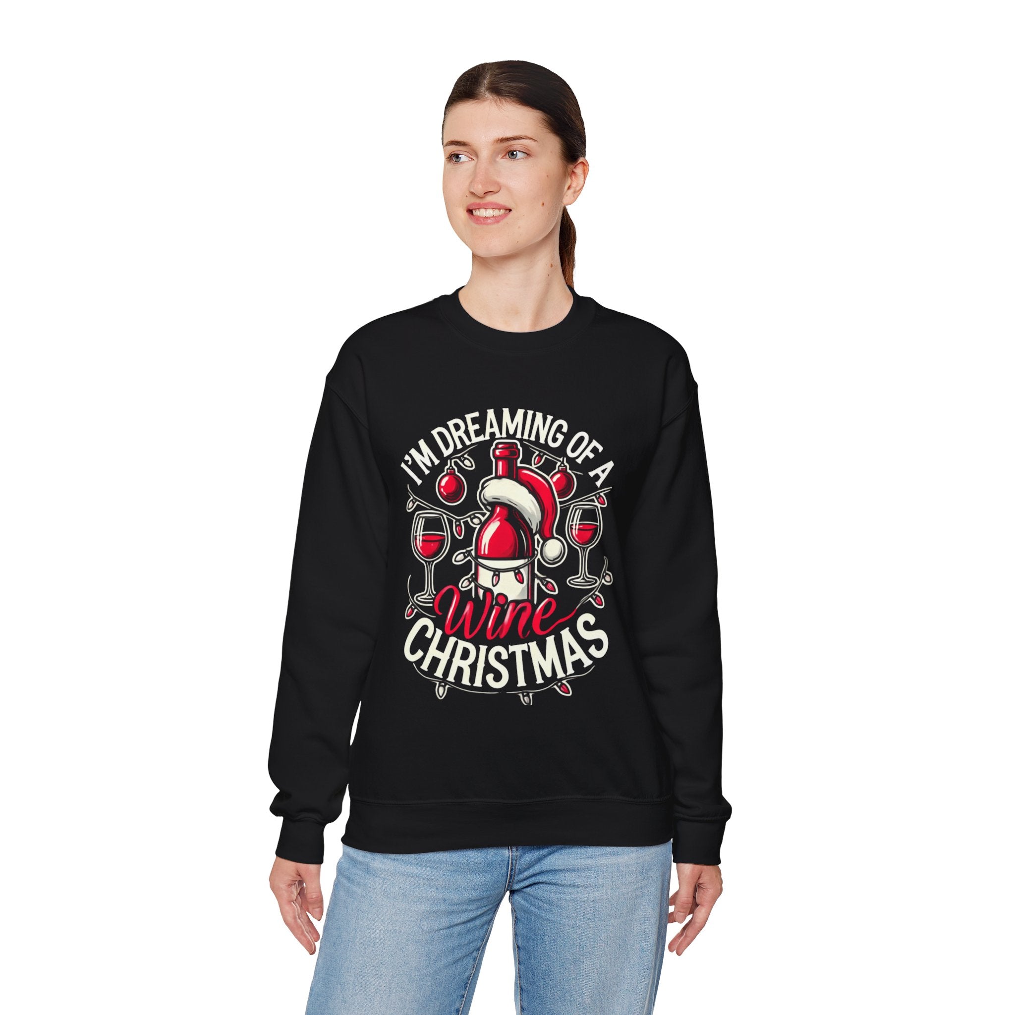 Black Christmas sweatshirt with a festive wine theme, featuring a Santa-capped wine bottle, wine glasses, ornaments, and the humorous text 'I'm Dreaming of a Wine Christmas.' Ideal holiday apparel for wine enthusiasts seeking a fun and stylish Christmas-themed sweatshirt.