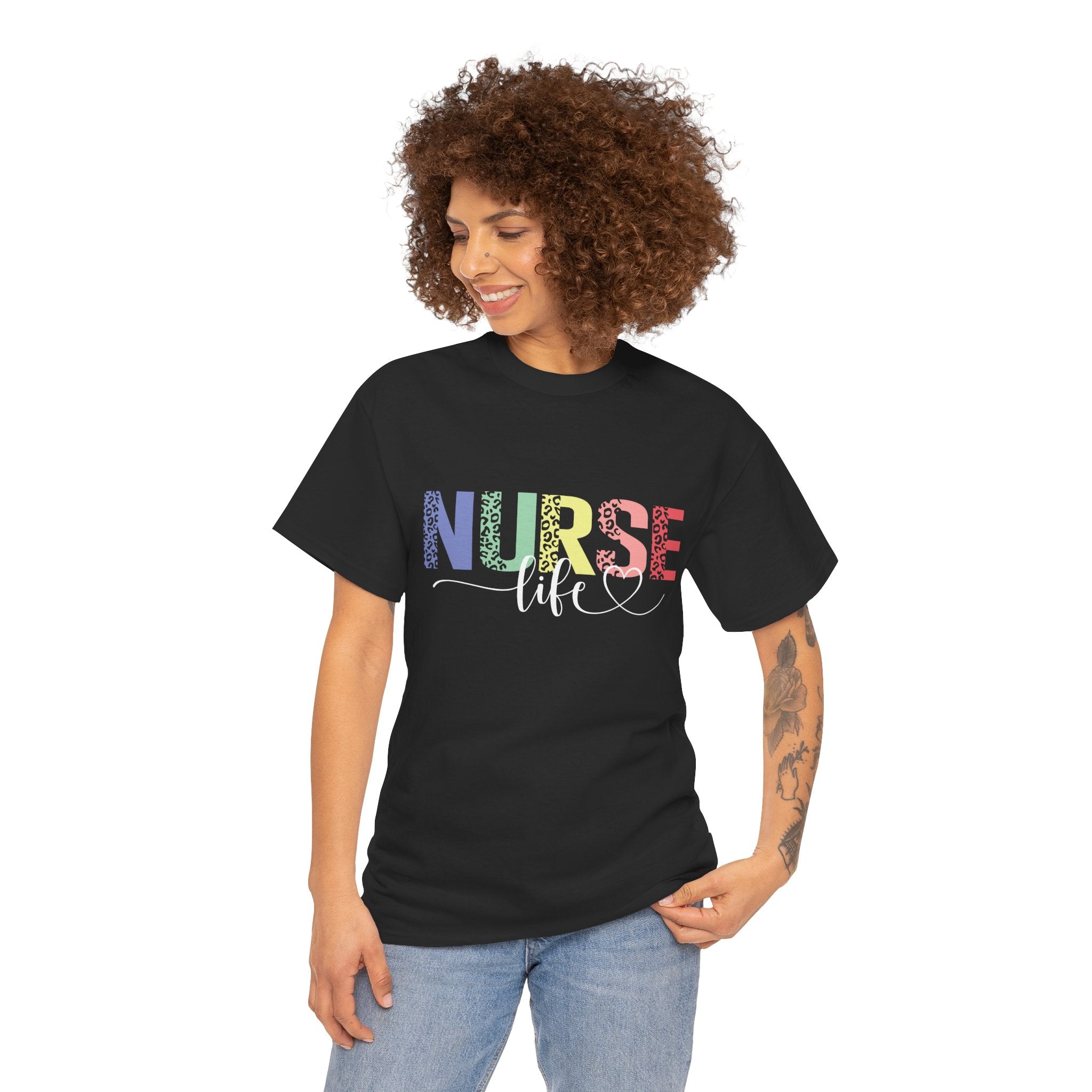 a woman wearing A black t-shirt with a colorful 'Nurse Life' design, showcasing nurse life t-shirt nurse week ideas for a stylish and professional look.