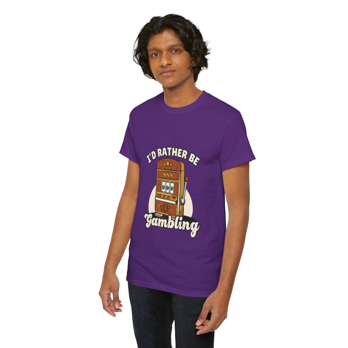 Person wearing a purple t-shirt with the text "I'd Rather Be Gambling" and an illustration of a slot machine. This funny casino game shirt is perfect for anyone who loves gambling humor and casino-inspired designs