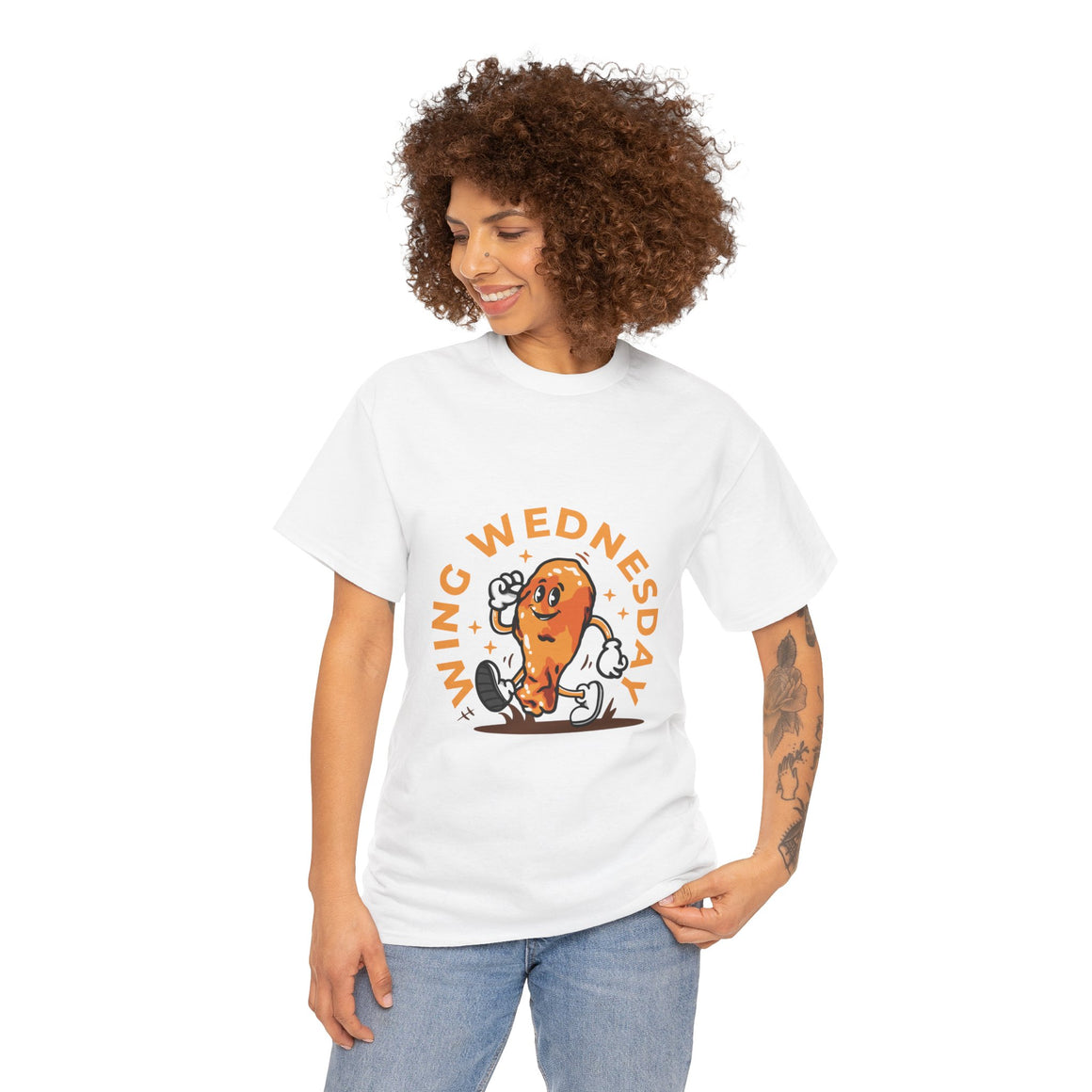 White T-shirt featuring a fun 'Wing Wednesday' design with a cartoon-style chicken wing character in motion. Perfect for food lovers and those who enjoy celebrating Wing Wednesday in style.