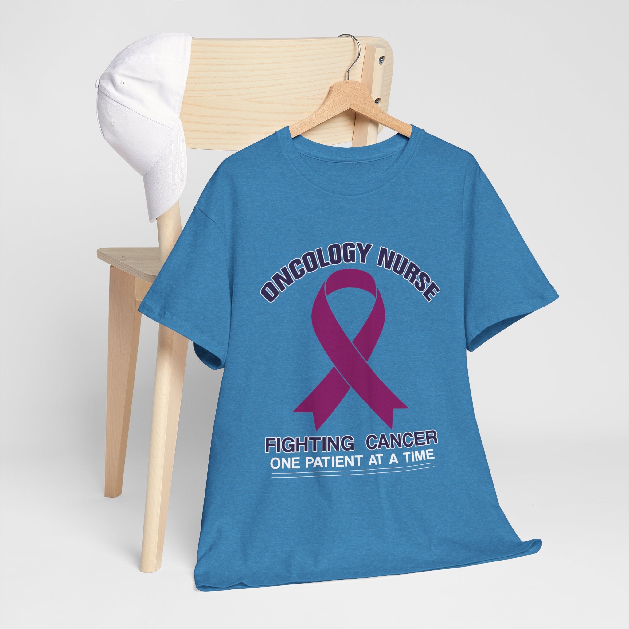 A t-shirt with the design 'Oncology Nurse - Fighting Cancer One Patient at a Time' featuring a purple cancer ribbon, part of the oncology nurse t-shirt designs collection, symbolizing strength and commitment in cancer care.