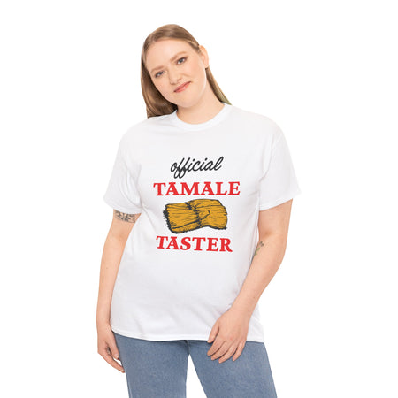 Smiling woman wearing a white T-shirt with bold red text 'Official Tamale Taster' and a tamale graphic, perfect for funny Christmas shirts and holiday gatherings.