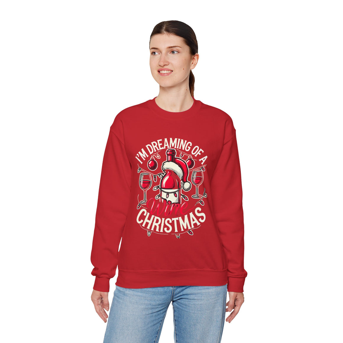 Red Christmas sweatshirt with a festive wine theme, featuring a Santa-capped wine bottle, wine glasses, ornaments, and the humorous text 'I'm Dreaming of a Wine Christmas.' Ideal holiday apparel for wine enthusiasts seeking a fun and stylish Christmas-themed sweatshirt.