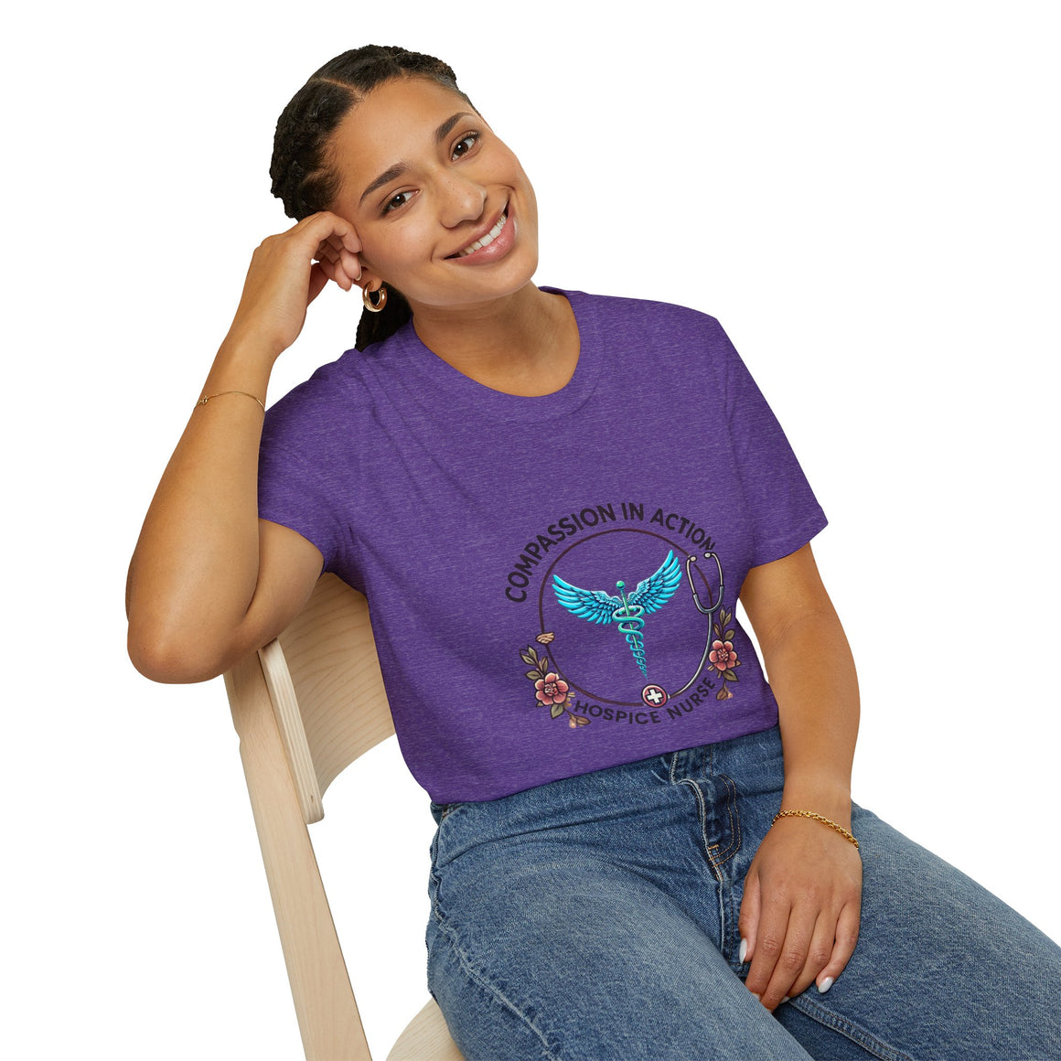 Heather Purple Hospice nurse t-shirt featuring the phrase 'Compassion in Action' with a medical caduceus symbol, flowers, and stethoscope graphic. Ideal for hospice nurses who bring compassion and care to their work.