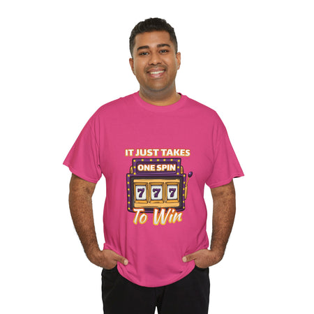 Person wearing a hot pink t-shirt with the text "It Just Takes One Spin To Win" and a slot machine illustration showing triple sevens. This is one of the popular gambling style shirts funny and perfect for anyone who loves casino humor and the thrill of winning.