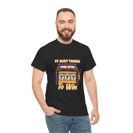 Person wearing a black t-shirt with the text "It Just Takes One Spin To Win" and a slot machine illustration showing triple sevens. This is one of the popular gambling style shirts funny and perfect for anyone who loves casino humor and the thrill of winning.