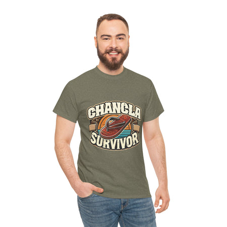 Funny Mexican t-shirt featuring the phrase 'Chancla Survivor. T-shirt featuring a retro-inspired 'Chancla Survivor' design with a graphic of a traditional sandal. Perfect for those with a sense of humor about family discipline and nostalgic cultural references.