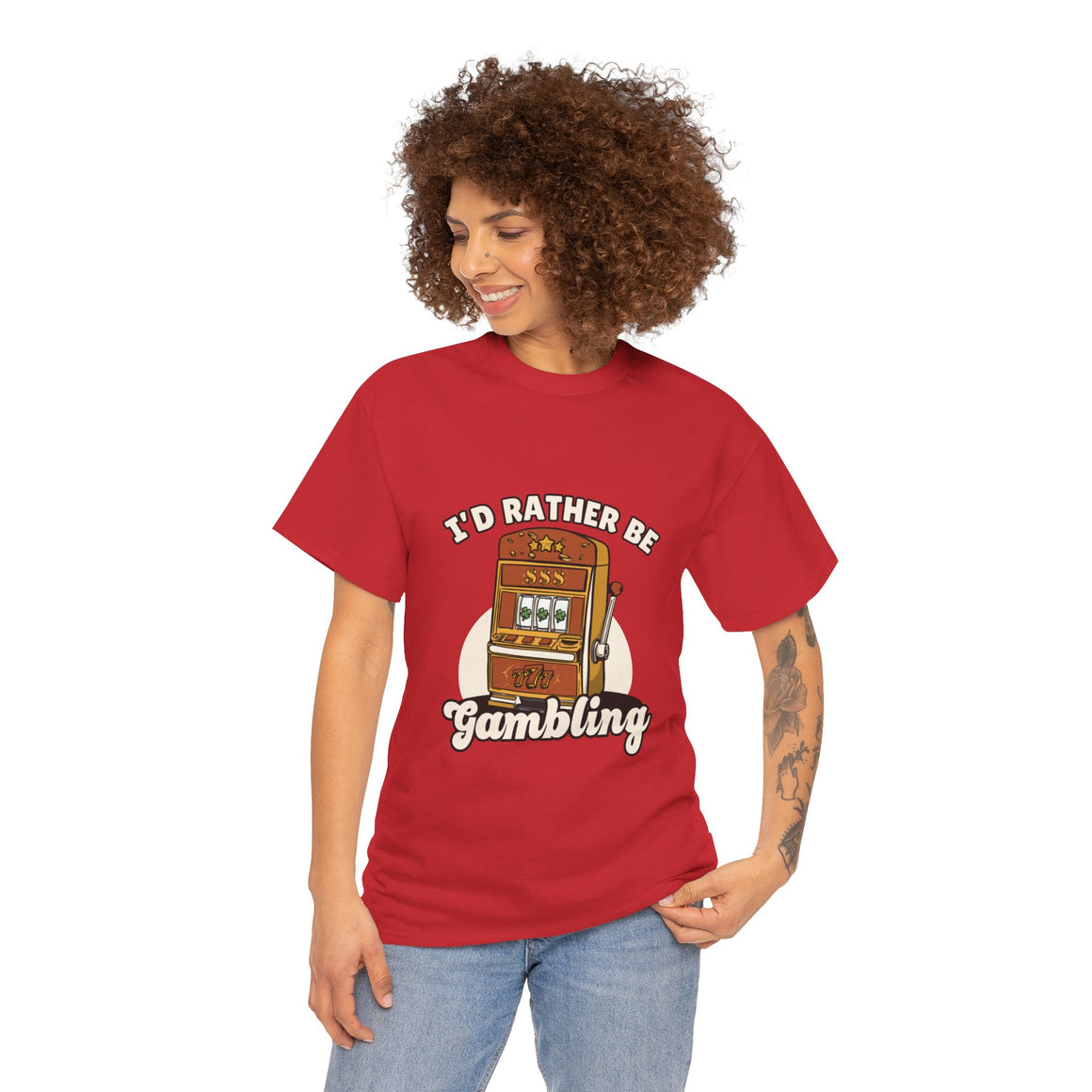 Person wearing a red t-shirt with the text "I'd Rather Be Gambling" and an illustration of a slot machine. This funny casino game shirt is perfect for anyone who loves gambling humor and casino-inspired designs