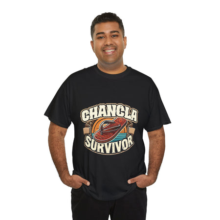 Funny Mexican t-shirt featuring the phrase 'Chancla Survivor. Black t-shirt featuring a retro-inspired 'Chancla Survivor' design with a graphic of a traditional sandal. Perfect for those with a sense of humor about family discipline and nostalgic cultural references.