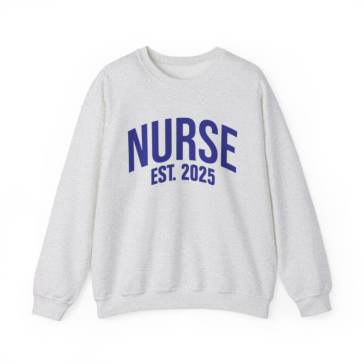 A white sweatshirt with bold blue text reading "NURSE EST. 2025." He stands confidently against a plain white background, smiling slightly. The sweatshirt design highlights the keyphrase "Nurse Est. 2025," making it a stylish and comfortable option for nursing students, graduates, or future nurses.