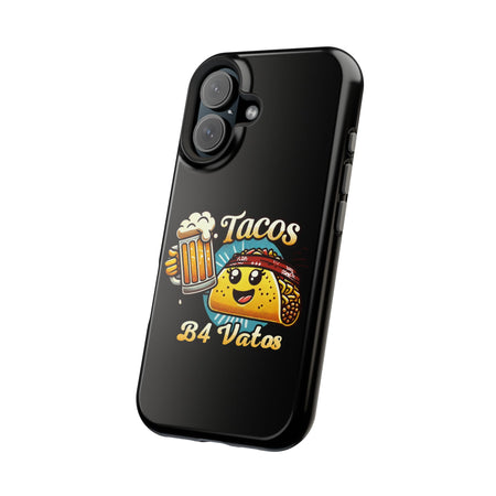 Black iPhone 16 magnetic phone case featuring a playful 'Tacos B4 Vatos' design with a cheerful taco character holding a frothy beer mug. Perfect for taco lovers who want a fun and unique phone accessory.