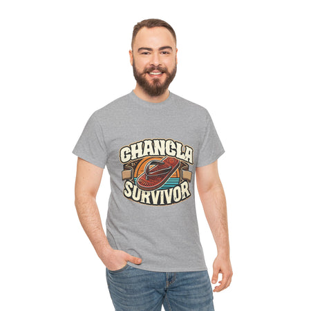 Funny Mexican t-shirt featuring the phrase 'Chancla Survivor. T-shirt featuring a retro-inspired 'Chancla Survivor' design with a graphic of a traditional sandal. Perfect for those with a sense of humor about family discipline and nostalgic cultural references.