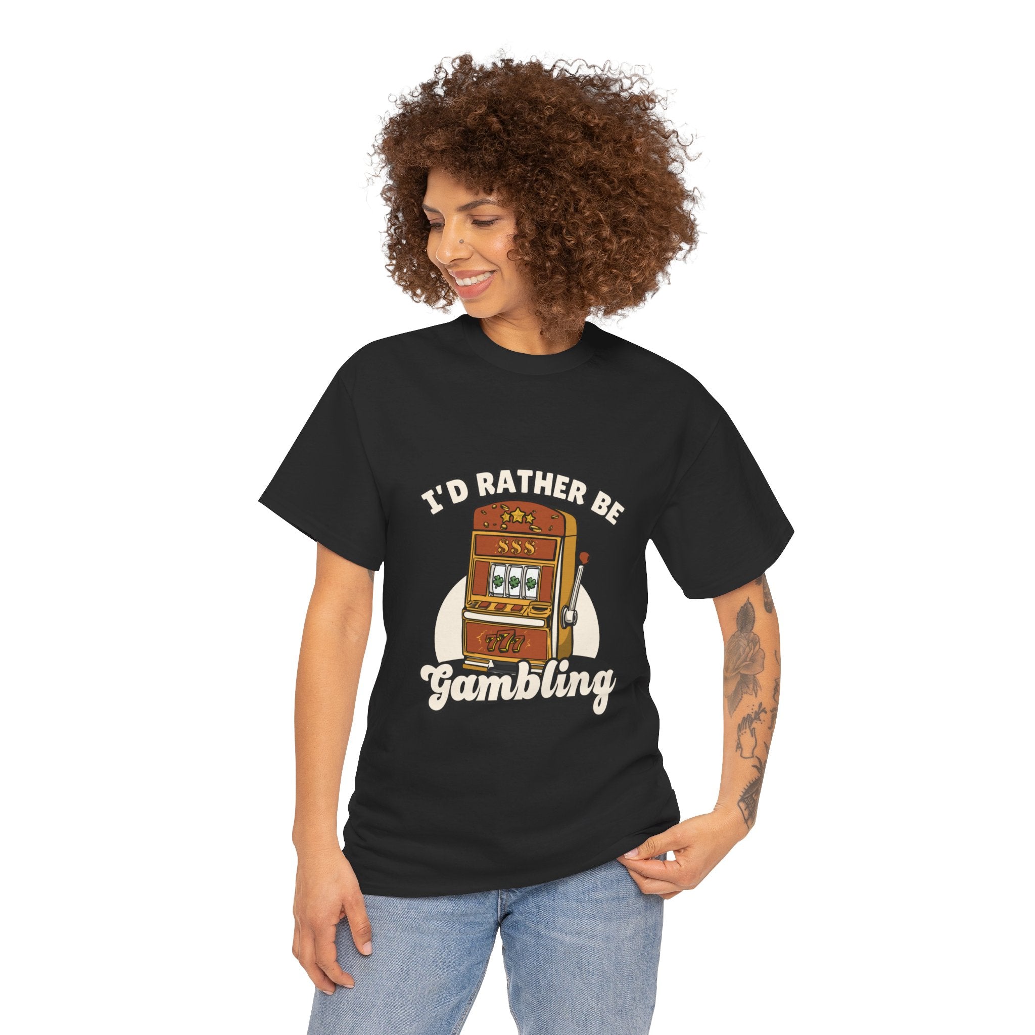 Person wearing a black t-shirt with the text "I'd Rather Be Gambling" and an illustration of a slot machine. This funny casino game shirt is perfect for anyone who loves gambling humor and casino-inspired designs