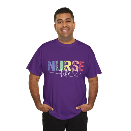 Smiling man wearing a purple t-shirt with a colorful 'Nurse Life' design, showcasing nurse life t-shirt nurse week ideas for a stylish and professional look.