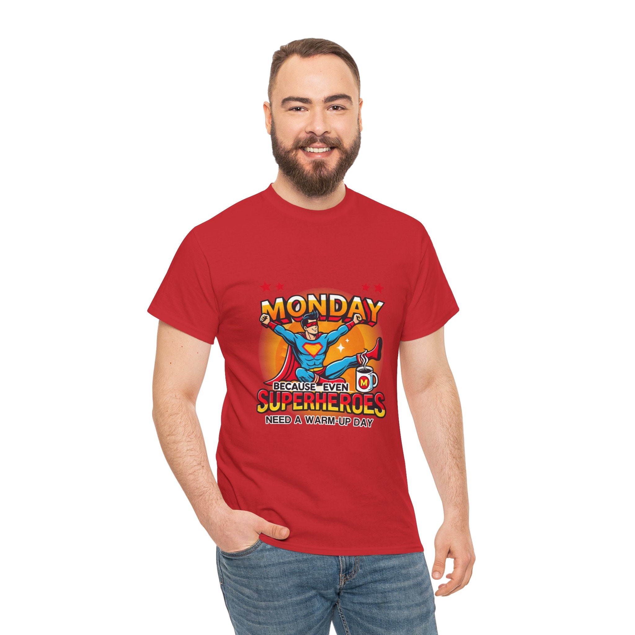 a man wearing a Red t-shirt with a humorous design featuring a superhero and the text 'Monday - Because Even Superheroes Need a Warm-Up Day.' A playful option in funny t-shirts for adults.