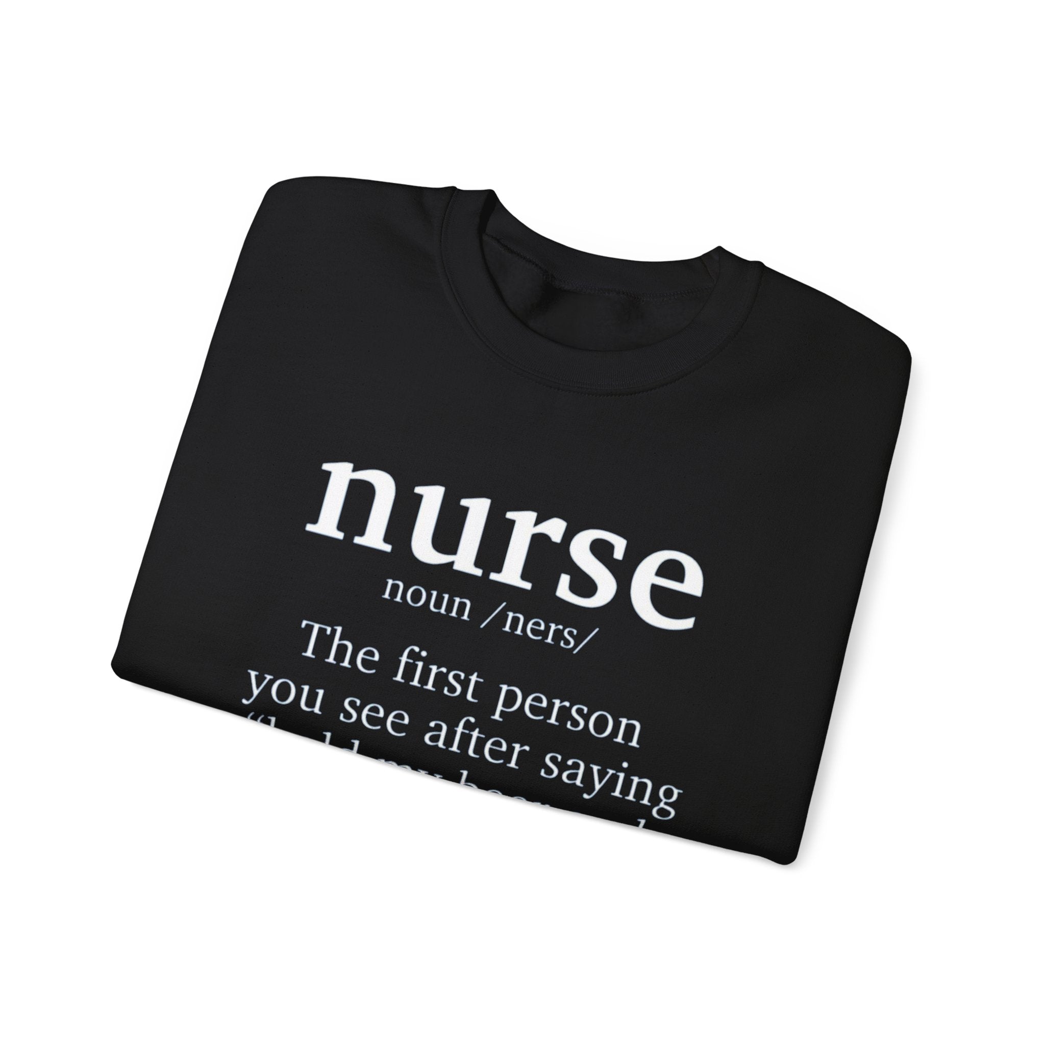 A black sweatshirt with the humorous text 'nurse: The first person you see after saying hold my beer and watch this.' Ideal for those looking for funny nurse-themed shirts that add a touch of humor to their wardrobe.