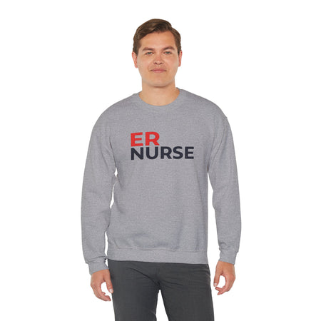 A man wearing a dark gray ER Nurse Sweatshirt, standing confidently against a white background.