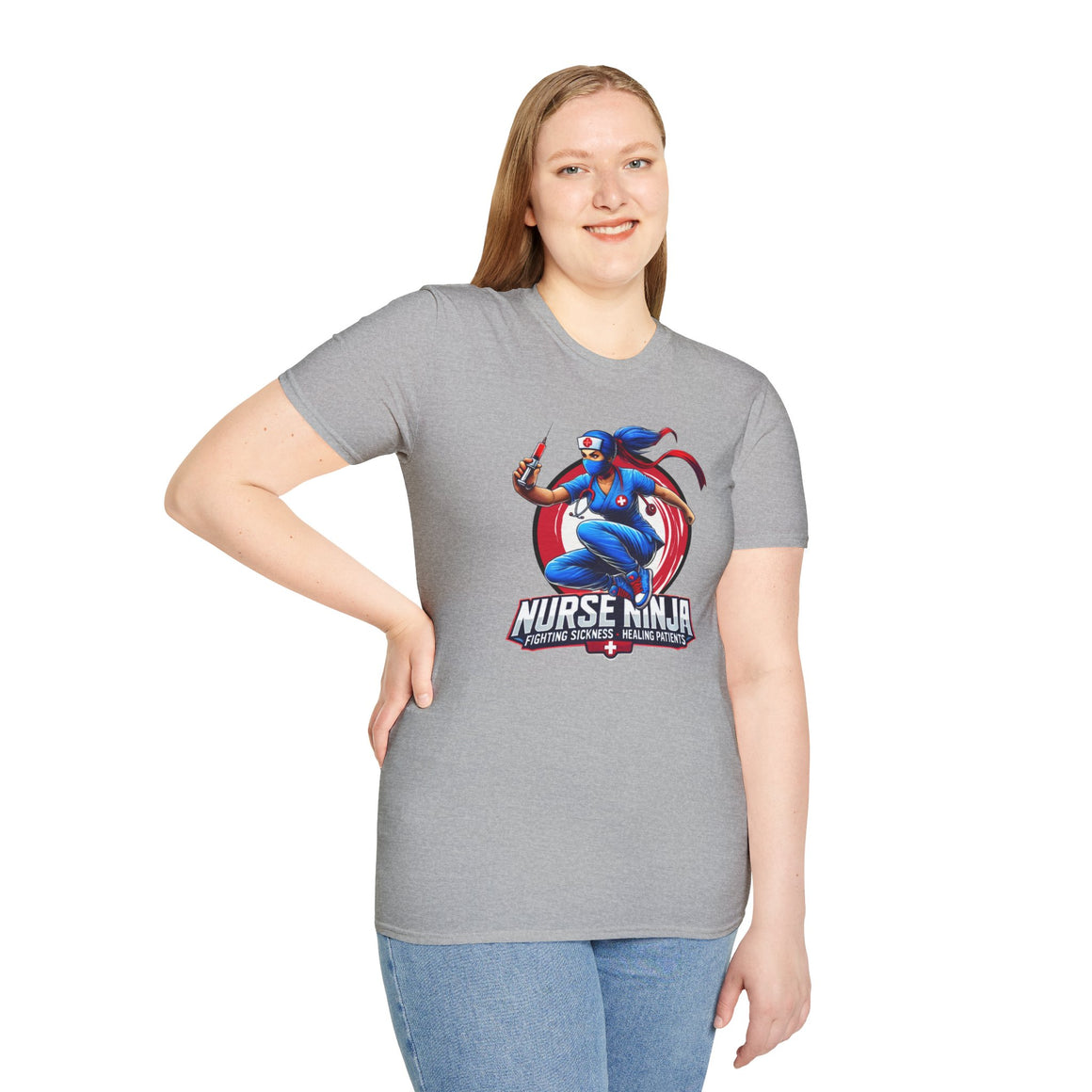A light grey T-shirt  featuring one of the Nurse Ninja t-shirt designs, depicting a dynamic nurse dressed as a ninja holding a syringe. The graphic includes the text "Nurse Ninja - Fighting Sickness, Healing Patients," showcasing a bold and heroic theme, perfect for healthcare professionals.