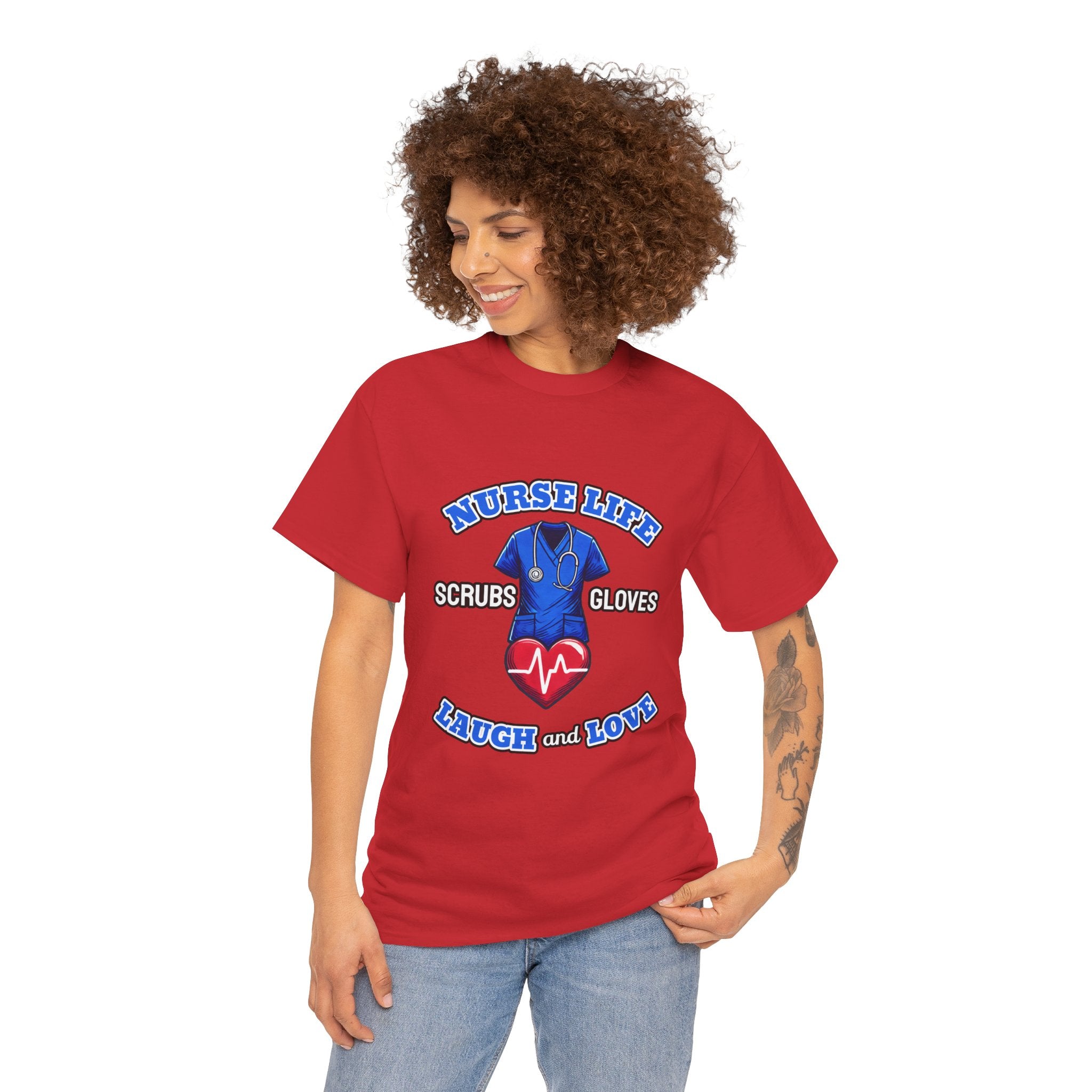 A smiling woman wearing a red T-shirt with the design "Nurse Life - Scrubs, Gloves, Laugh and Love," featuring a stethoscope and heart symbol. This shirt is part of a Nurse Week clothing gift collection, ideal for nurses to celebrate and showcase their dedication. Perfect for Nurse Week clothing gifts for nurses.