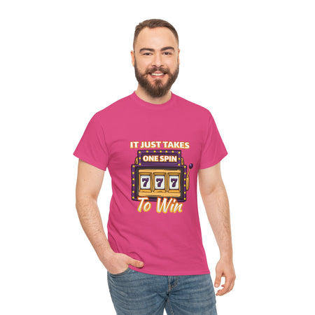 Person wearing a hot pink t-shirt with the text "It Just Takes One Spin To Win" and a slot machine illustration showing triple sevens. This is one of the popular gambling style shirts funny and perfect for anyone who loves casino humor and the thrill of winning.