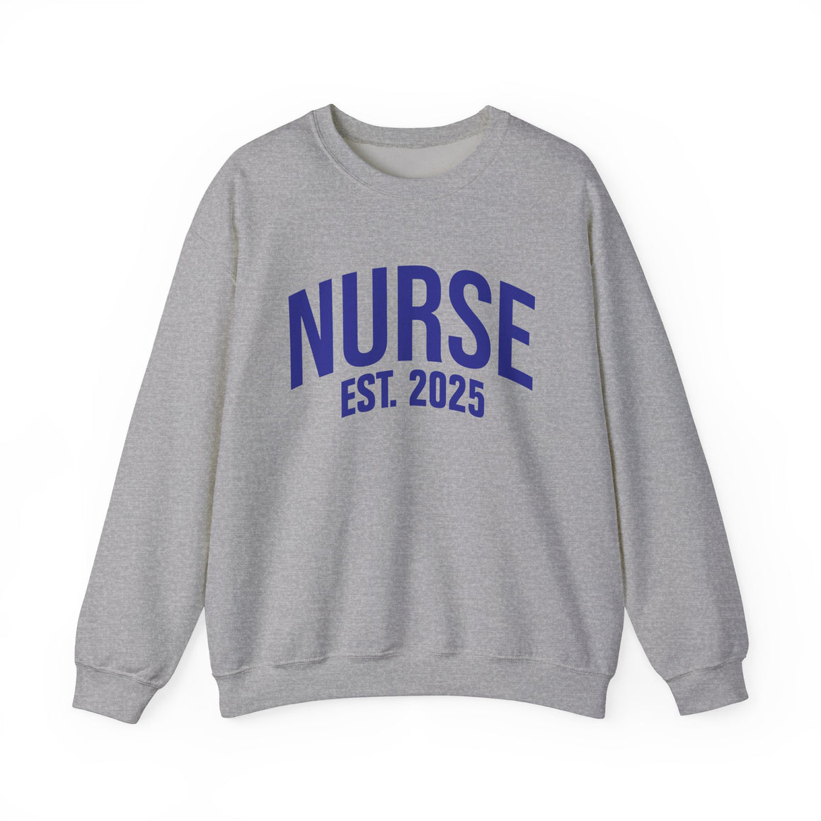 A light grey sweatshirt with bold blue text reading "NURSE EST. 2025." He stands confidently against a plain white background, smiling slightly. The sweatshirt design highlights the keyphrase "Nurse Est. 2025," making it a stylish and comfortable option for nursing students, graduates, or future nurses.