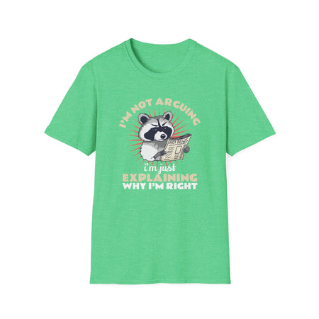 T-shirt featuring a humorous raccoon graphic holding a newspaper with the text 'I'm Not Arguing, I'm Just Explaining Why I'm Right.' Ideal for those with a witty, playful personality who appreciate sarcastic humor.