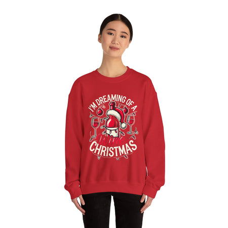 Red Christmas sweatshirt with a festive wine theme, featuring a Santa-capped wine bottle, wine glasses, ornaments, and the humorous text 'I'm Dreaming of a Wine Christmas.' Ideal holiday apparel for wine enthusiasts seeking a fun and stylish Christmas-themed sweatshirt.