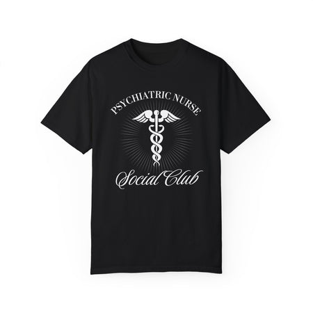 A nurse standing wearing a shirt that says Psychiatric Nurse Social Club and has a grapgic of a nurses caduceus