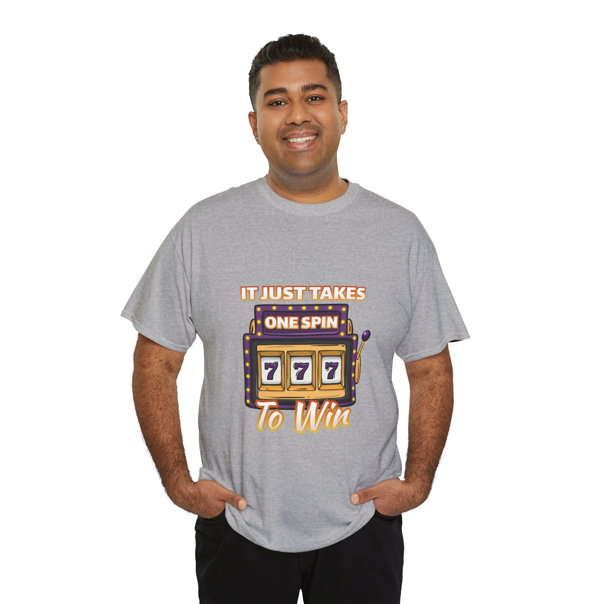 Person wearing a grey t-shirt with the text "It Just Takes One Spin To Win" and a slot machine showing triple sevens. This shirt is one of the humorous casino-inspired shirts, perfect for anyone who enjoys a touch of gambling humor and the excitement of casino games.