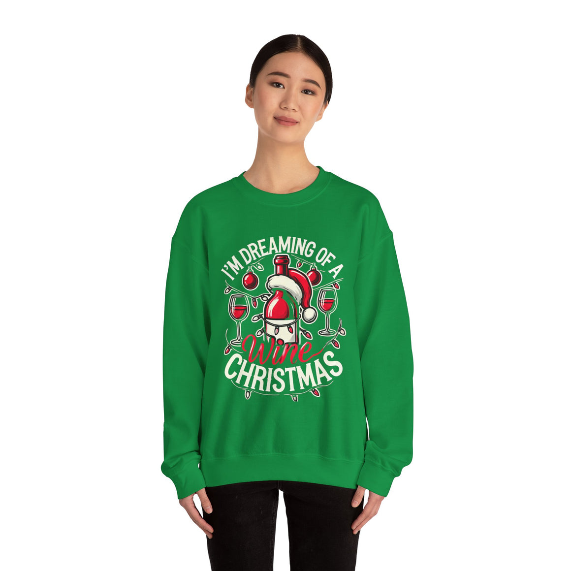 Green Christmas sweatshirt with a festive wine theme, featuring a Santa-capped wine bottle, wine glasses, ornaments, and the humorous text 'I'm Dreaming of a Wine Christmas.' Ideal holiday apparel for wine enthusiasts seeking a fun and stylish Christmas-themed sweatshirt.