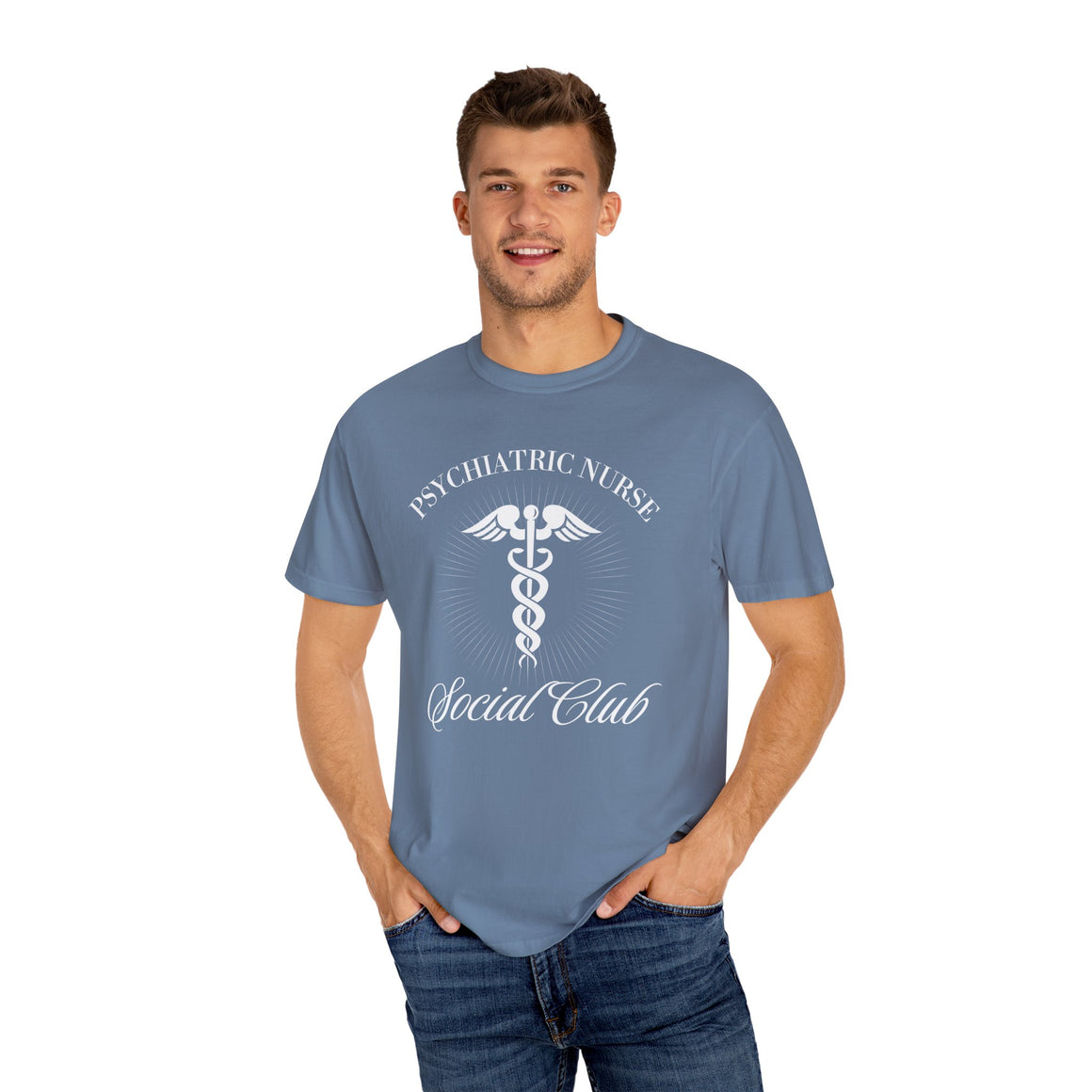 A nurse standing wearing a shirt that says Psychiatric Nurse Social Club and has a grapgic of a nurses caduceus