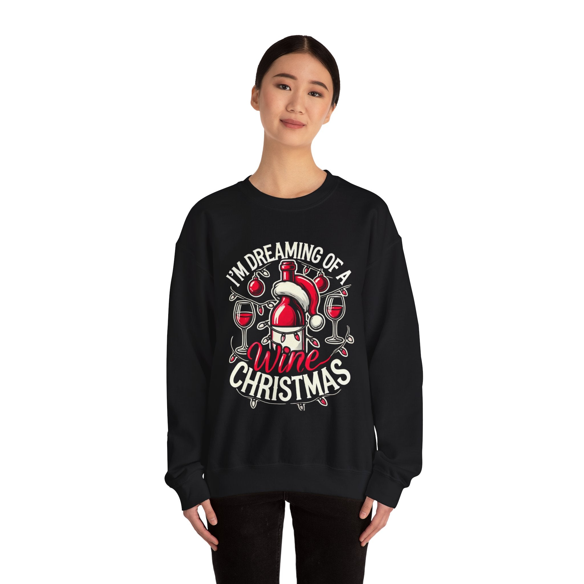 Black Christmas sweatshirt with a festive wine theme, featuring a Santa-capped wine bottle, wine glasses, ornaments, and the humorous text 'I'm Dreaming of a Wine Christmas.' Ideal holiday apparel for wine enthusiasts seeking a fun and stylish Christmas-themed sweatshirt.