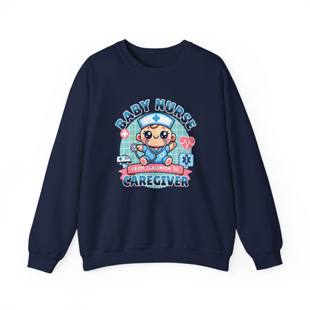 A Navy Blue sweatshirt with a cute, cartoon-style design that reads 'Baby Nurse - From Classroom to Caregiver.' The graphic features a smiling baby nurse character in scrubs, holding a stethoscope, with icons of medical elements like an ambulance, heartbeat, and medical cross around. 