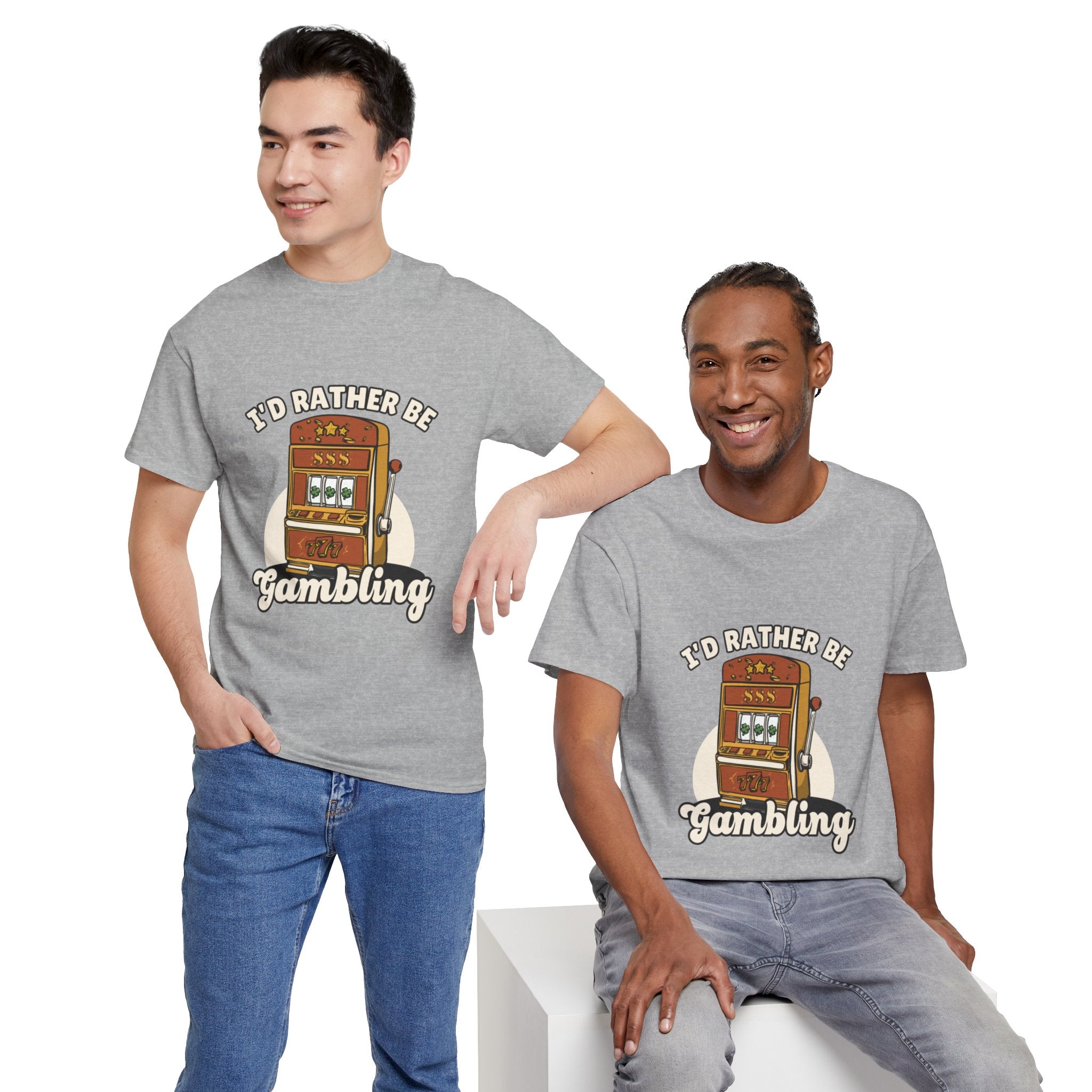 Person wearing a grey t-shirt with the text "I'd Rather Be Gambling" and an illustration of a slot machine. This funny casino game shirt is perfect for anyone who loves gambling humor and casino-inspired designs