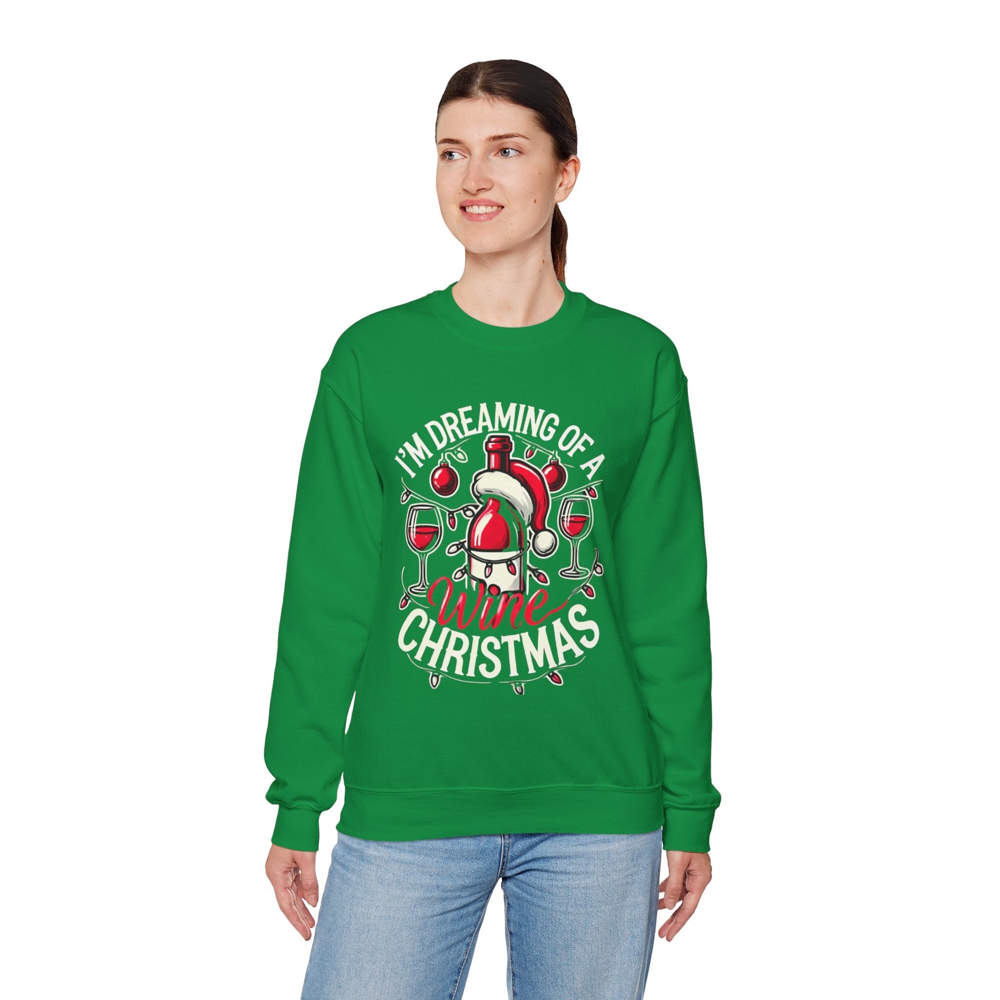 Green Christmas sweatshirt with a festive wine theme, featuring a Santa-capped wine bottle, wine glasses, ornaments, and the humorous text 'I'm Dreaming of a Wine Christmas.' Ideal holiday apparel for wine enthusiasts seeking a fun and stylish Christmas-themed sweatshirt.