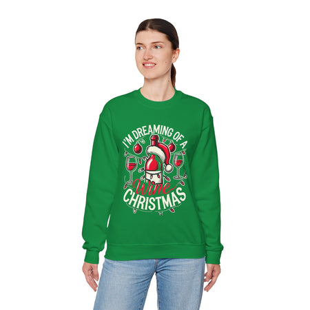 Green Christmas sweatshirt with a festive wine theme, featuring a Santa-capped wine bottle, wine glasses, ornaments, and the humorous text 'I'm Dreaming of a Wine Christmas.' Ideal holiday apparel for wine enthusiasts seeking a fun and stylish Christmas-themed sweatshirt.