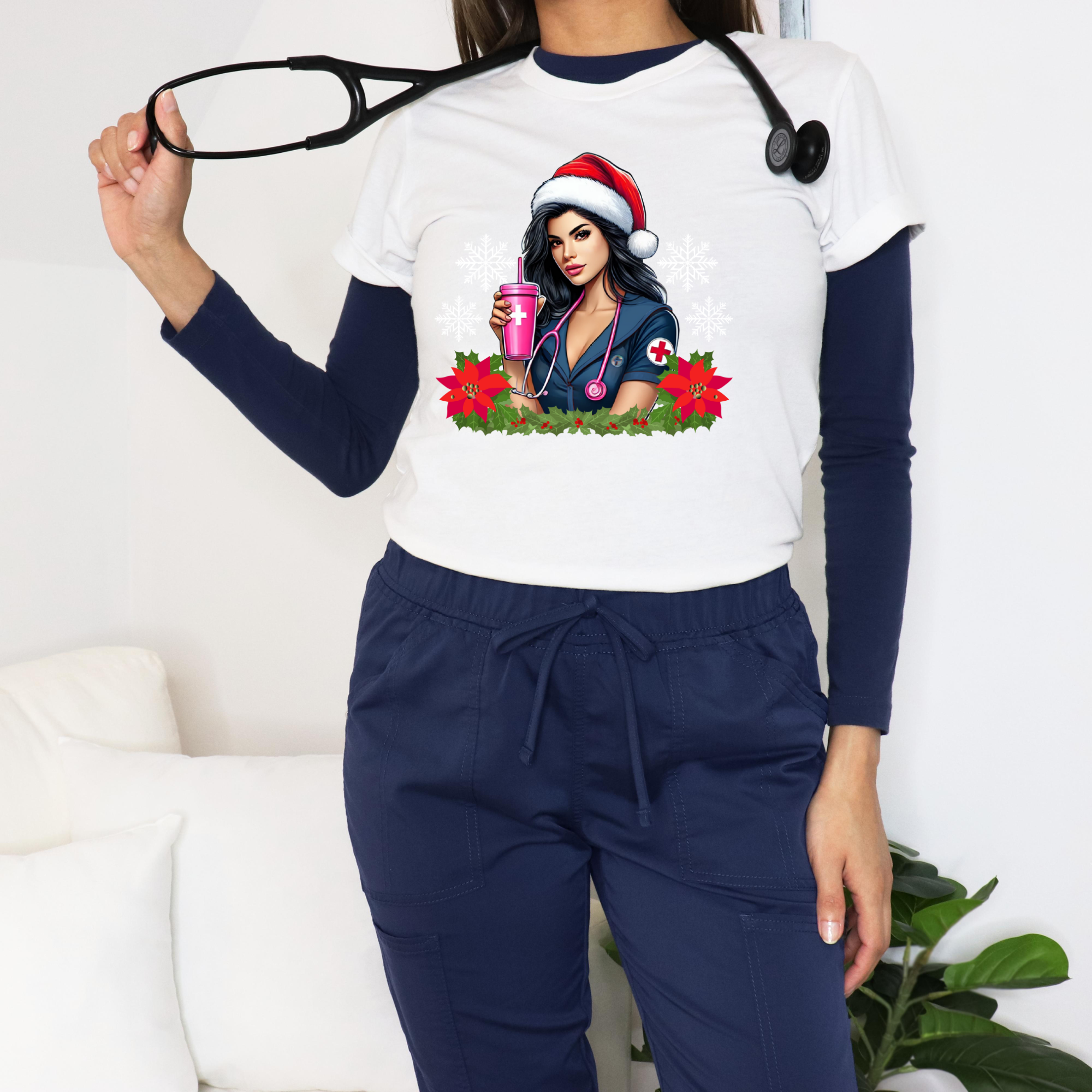 White Christmas nurse-themed t-shirt featuring a stylish nurse in a Santa hat holding a festive pink drink, adorned with poinsettias and holiday greenery. Perfect holiday apparel for nurses looking to add festive cheer to their wardrobe.