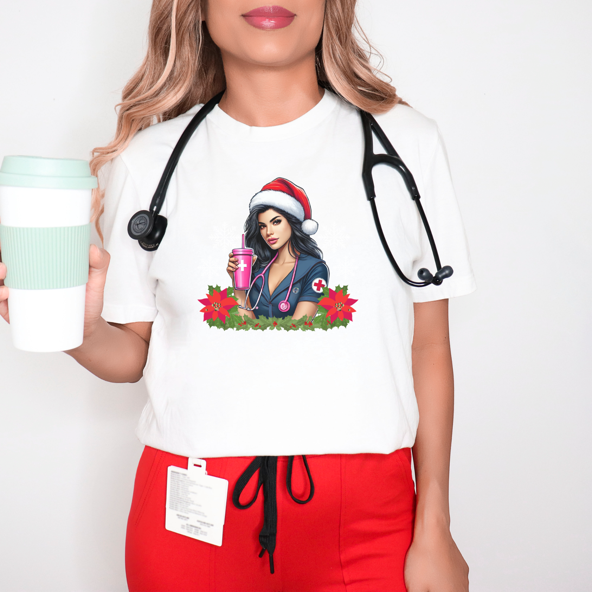 White nurse-themed Christmas t-shirt featuring a stylish nurse in a Santa hat holding a festive pink drink, adorned with poinsettias and holiday greenery. Perfect holiday apparel for nurses looking to add festive cheer to their wardrobe.