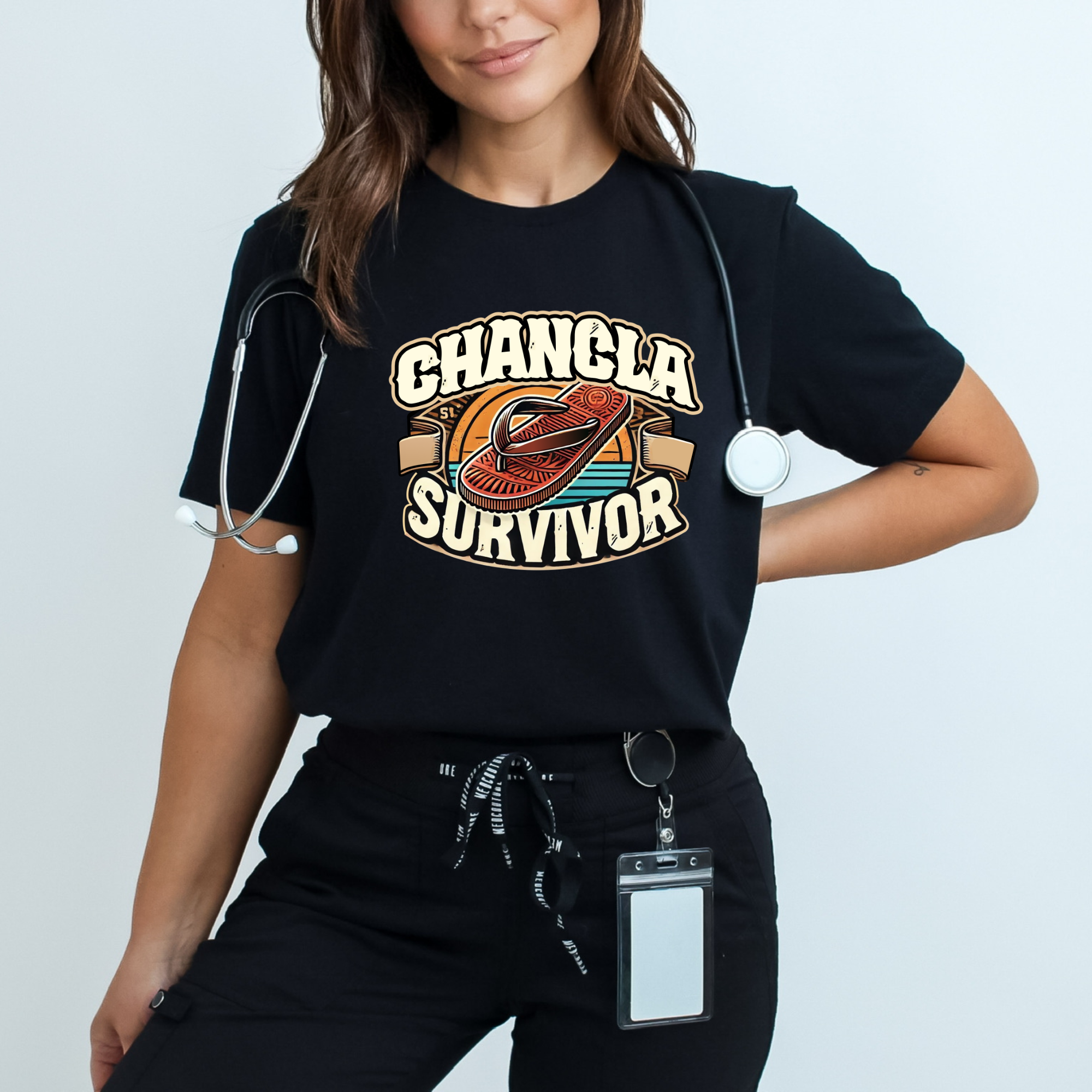 Funny Mexican t-shirt featuring the phrase 'Chancla Survivor.' A woman in scrubs with a stethoscope around her neck, showing a playful and humorous take on the iconic 'chancla' tradition. Perfect for healthcare professionals with a sense of humor and pride in their cultural heritage.