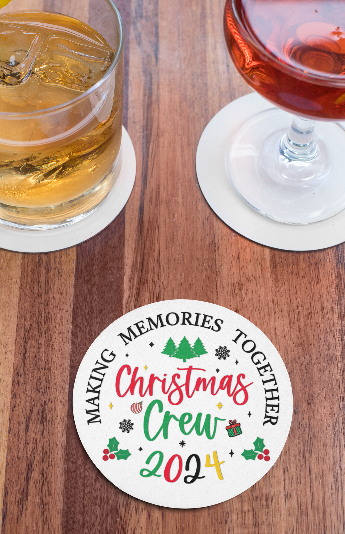 Christmas Crew 2024 ceramic coaster with festive design featuring trees, holly, snowflakes, and gift icons. Text reads 'Making Memories Together,' ideal for holiday gatherings, Christmas parties, and seasonal decor. Perfect for adding a cheerful touch to holiday tables and drinkware.