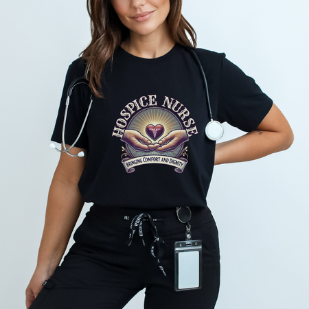 Black Hospice nurse t-shirt featuring a compassionate design with hands holding a heart and the phrase 'Bringing Comfort and Dignity,' symbolizing the care and support provided by hospice nurses. Ideal for hospice nurses who are dedicated to their mission.