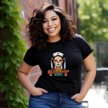 A picture of a nurse wearing a t shirt with a graphic of the day of the dead nurse on the front and it reads La Enfermera