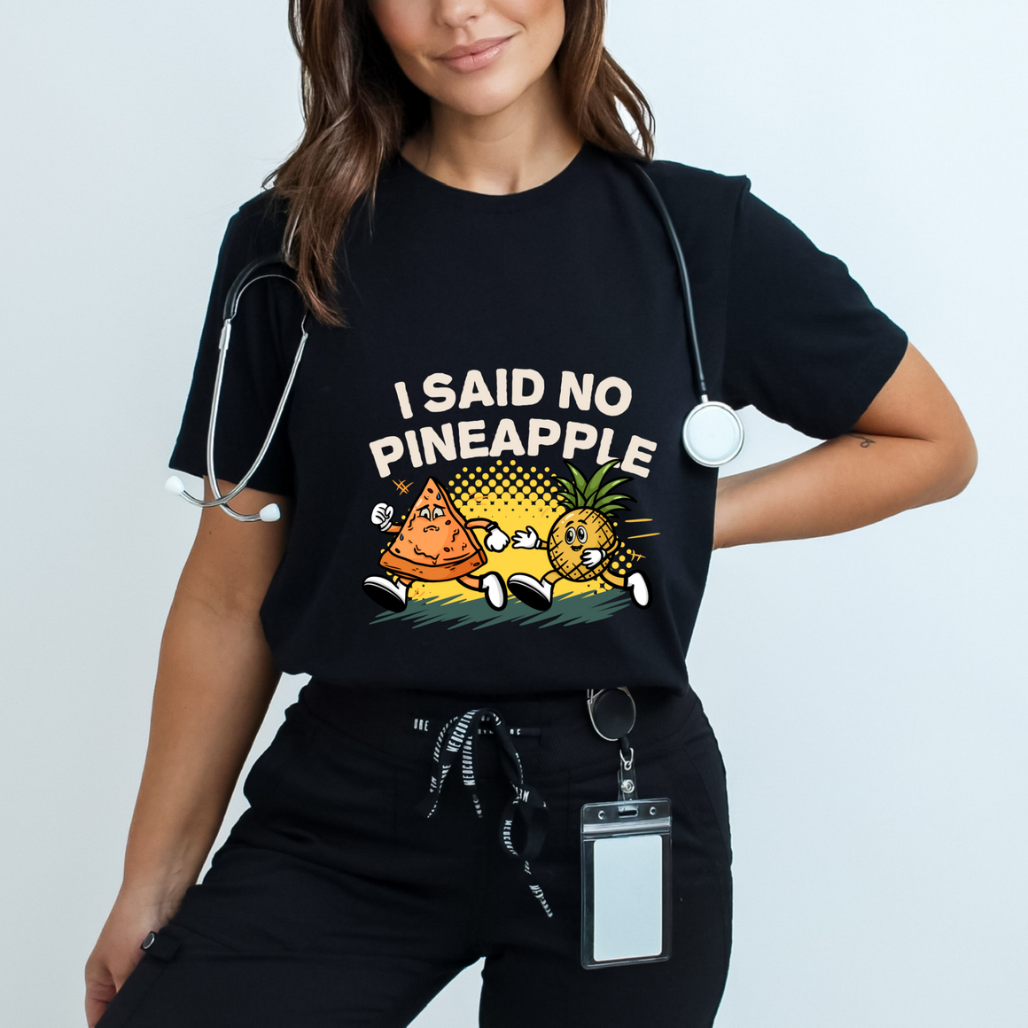 Black T-shirt featuring a humorous 'I Said No Pineapple' design with animated characters of a pizza slice and a pineapple in a playful scene. Perfect for pizza lovers with a sense of humor about the pineapple-on-pizza debate.