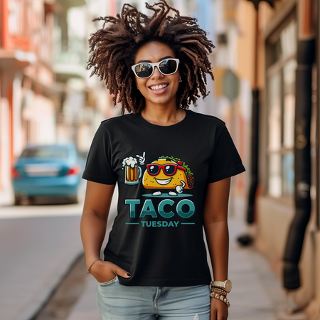 Black 'Taco Tuesday' t-shirt featuring a fun taco character wearing sunglasses and holding a frothy beer mug. Perfect for celebrating Taco Tuesday in a playful, foodie-inspired style.