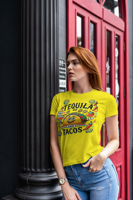 Bright Yellow T-shirt featuring a festive 'Tequila and Tacos' design with a smiling taco character, tequila bottle, margarita glass, lime slices, and chili peppers. Perfect for celebrating fiestas and taco nights with a fun and lively style.