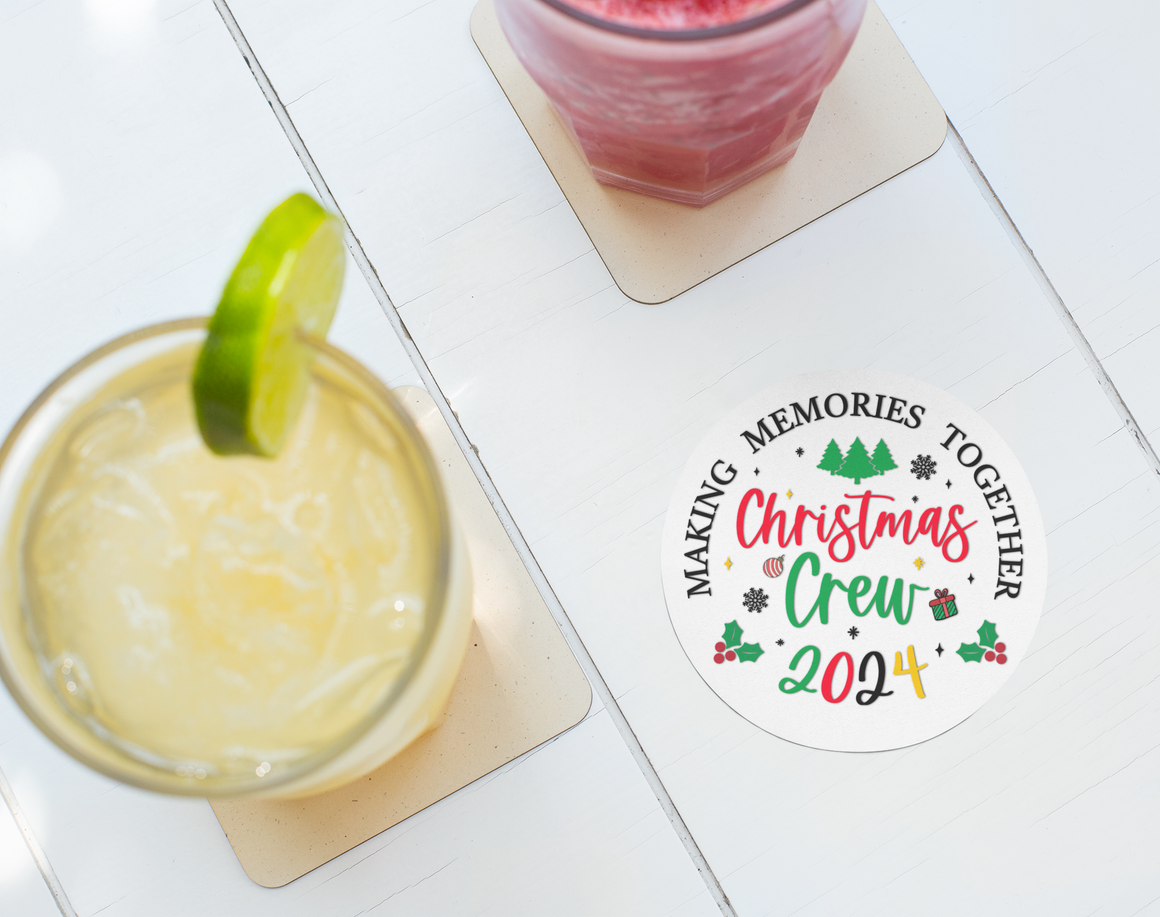 Christmas Crew 2024 ceramic coaster with festive design featuring trees, holly, snowflakes, and gift icons. Text reads 'Making Memories Together,' ideal for holiday gatherings, Christmas parties, and seasonal decor. Perfect for adding a cheerful touch to holiday tables and drinkware.